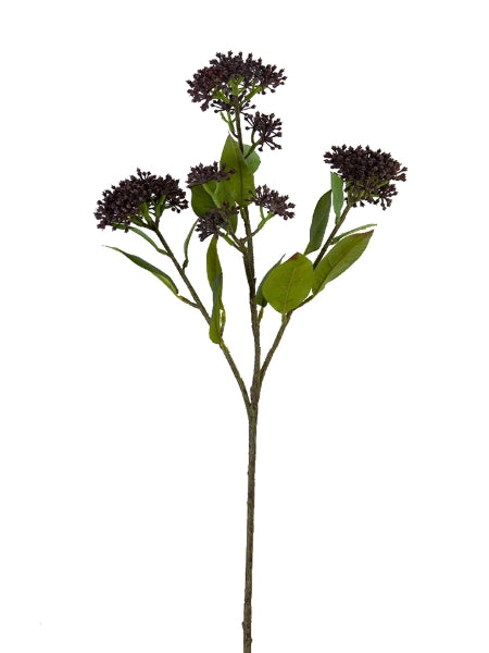 Artificial plant stem with purple flowers and green leaves on a white background
