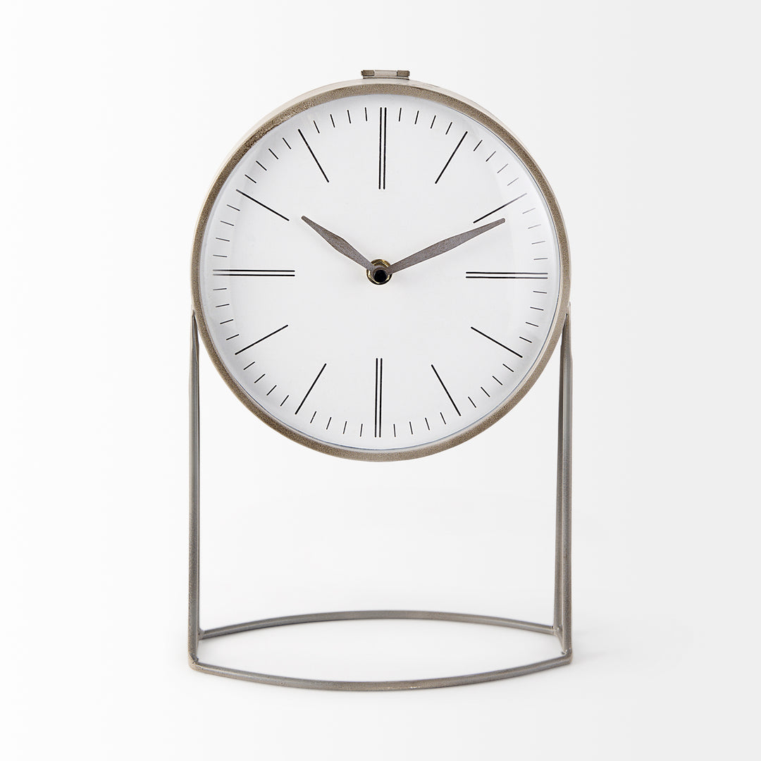 Modern table clock with white face and metallic frame on a white background