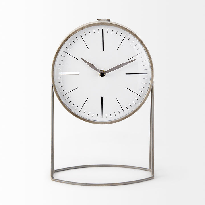 Modern table clock with white face and metallic frame on a white background