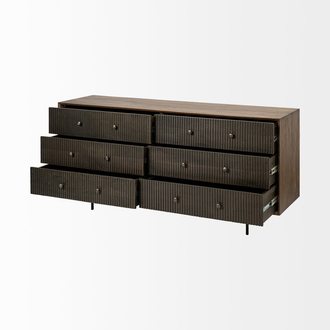 Wooden dresser with multiple drawers on a white background