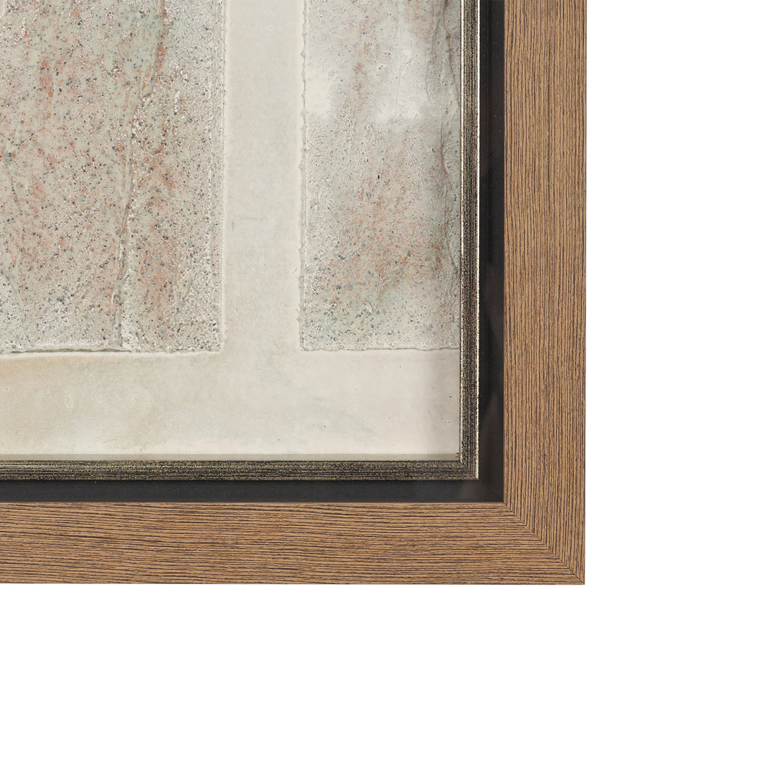 Close-up of a wooden picture frame with a textured wall background