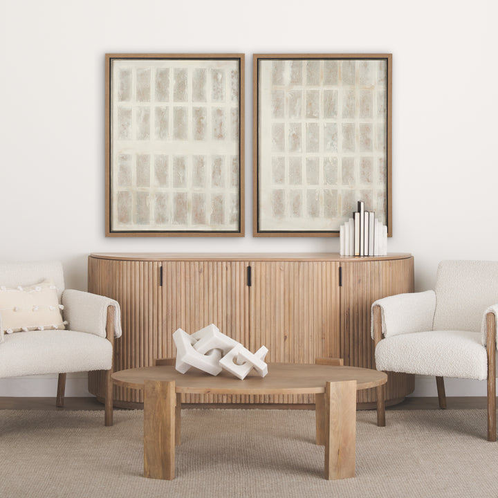 Modern living room with wooden furniture, white chairs, and abstract art on a white wall.