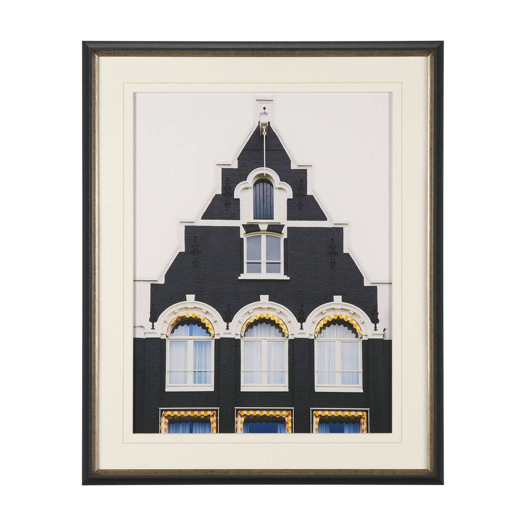 Framed artwork of a building with decorative elements on a white background