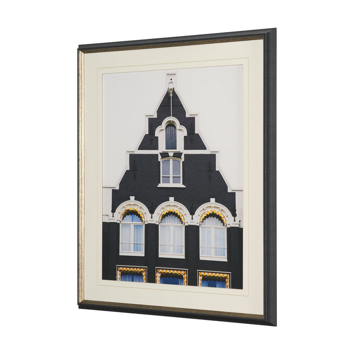Framed artwork of a building with decorative elements on a white background