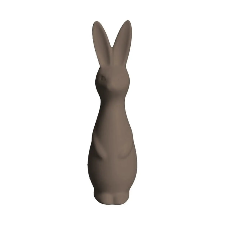 Brown rabbit-shaped object on a white background