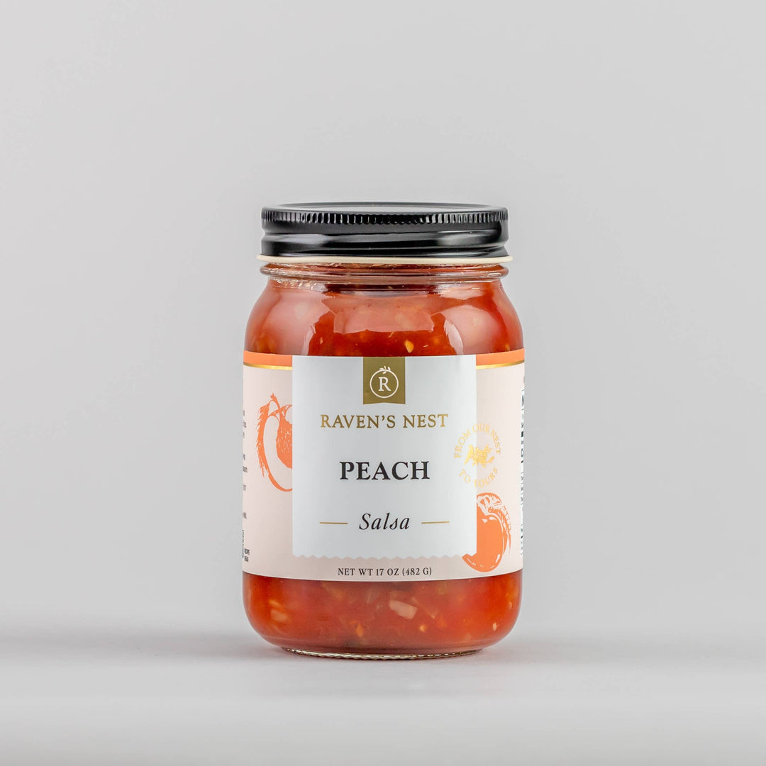 Jar of Peach Salsa from Raven's Nest on a gray background
