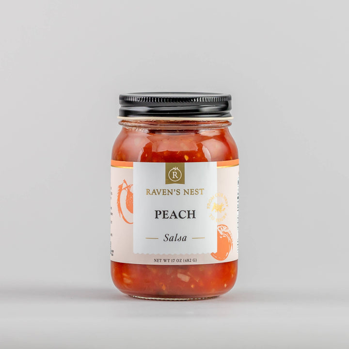 Jar of Peach Salsa from Raven's Nest on a gray background
