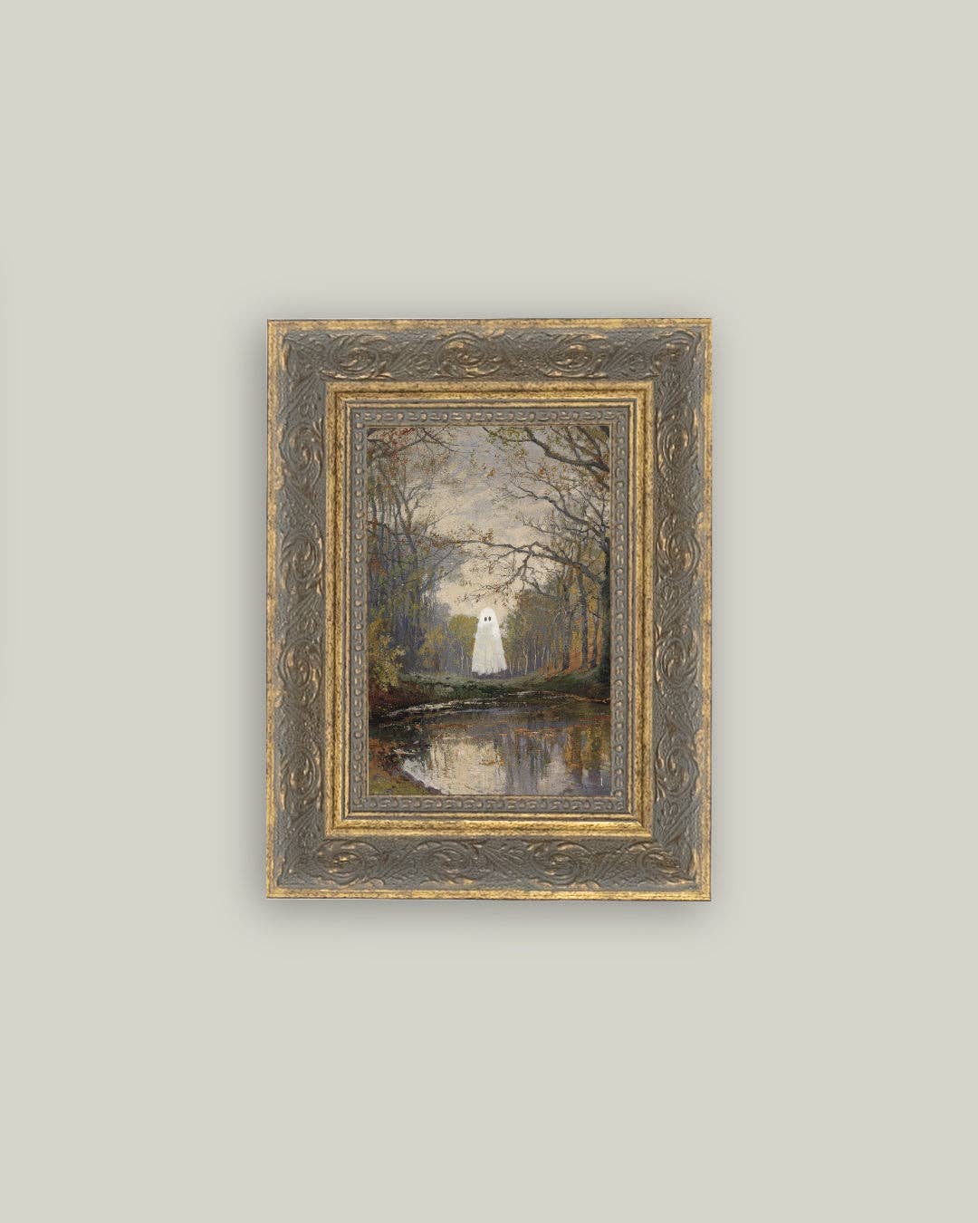 Framed artwork of a person in a white dress standing by a lake with trees on a gray background