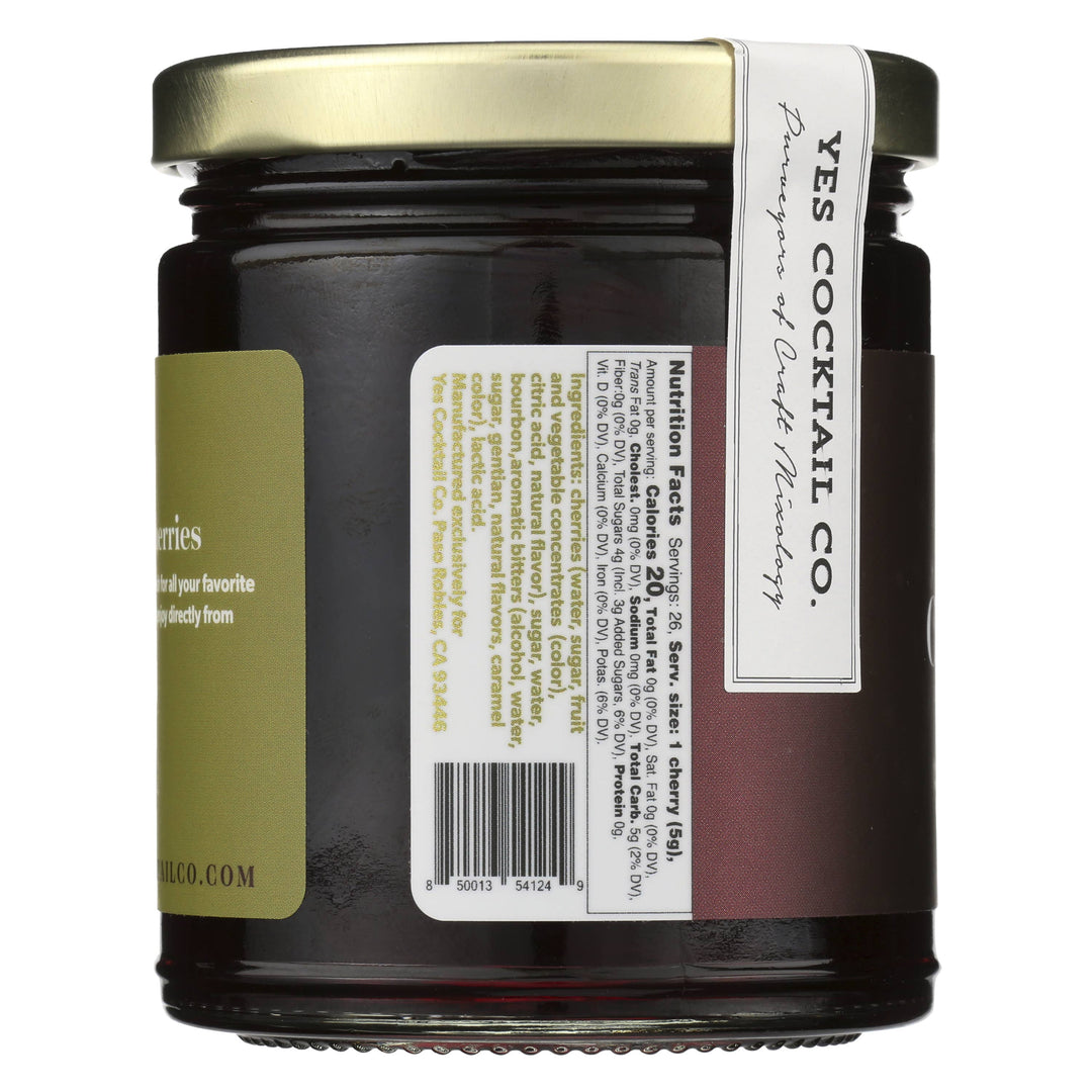 Jar of bourbon-infused cherries with a maroon label on a white background