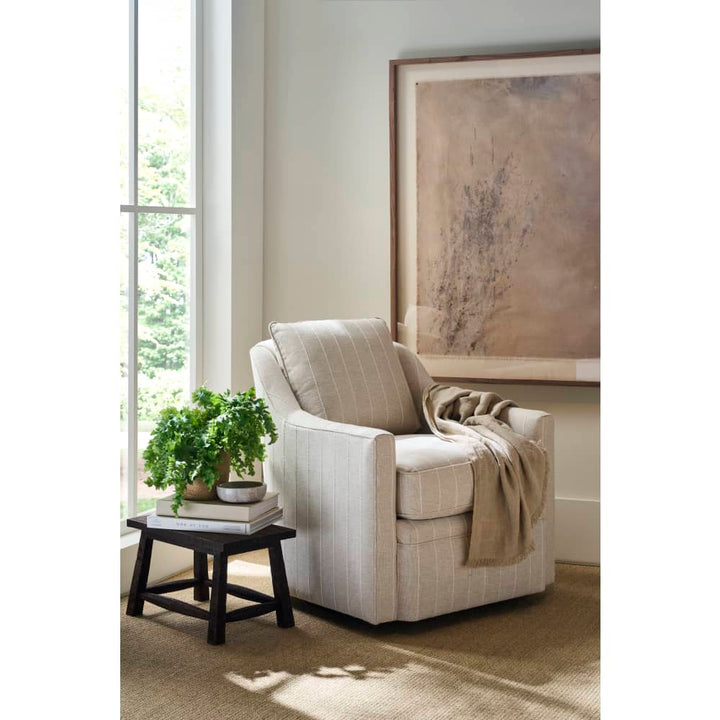 Beige swivel chair with stripes