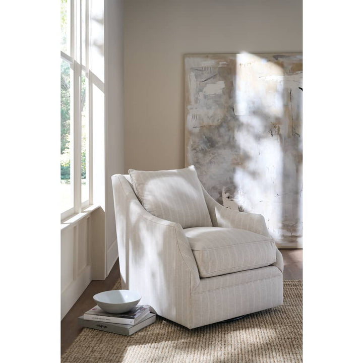 ivory striped swivel armchair with cushions