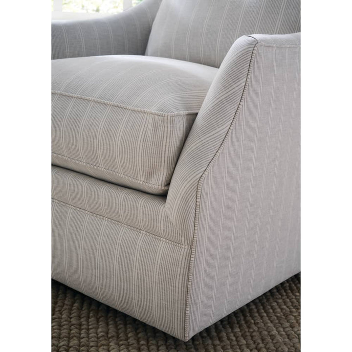 ivory striped swivel armchair with cushions