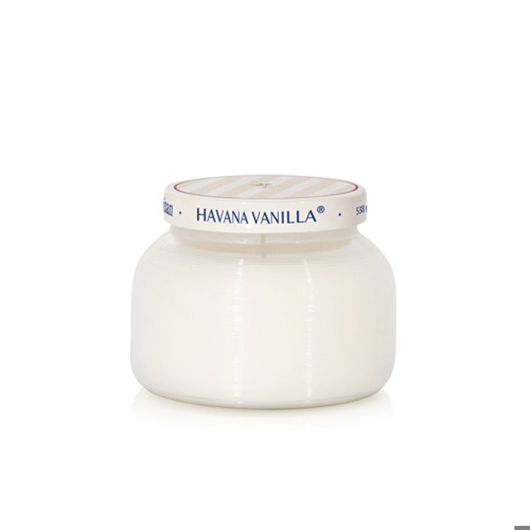 White candle jar with 'Havana Vanilla' label on a white background