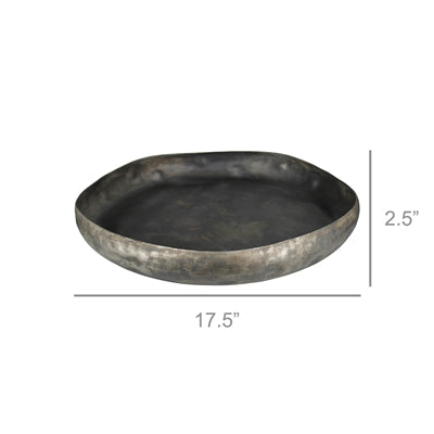 A round metal tray with a hand hammered texture and an antiqued finish.