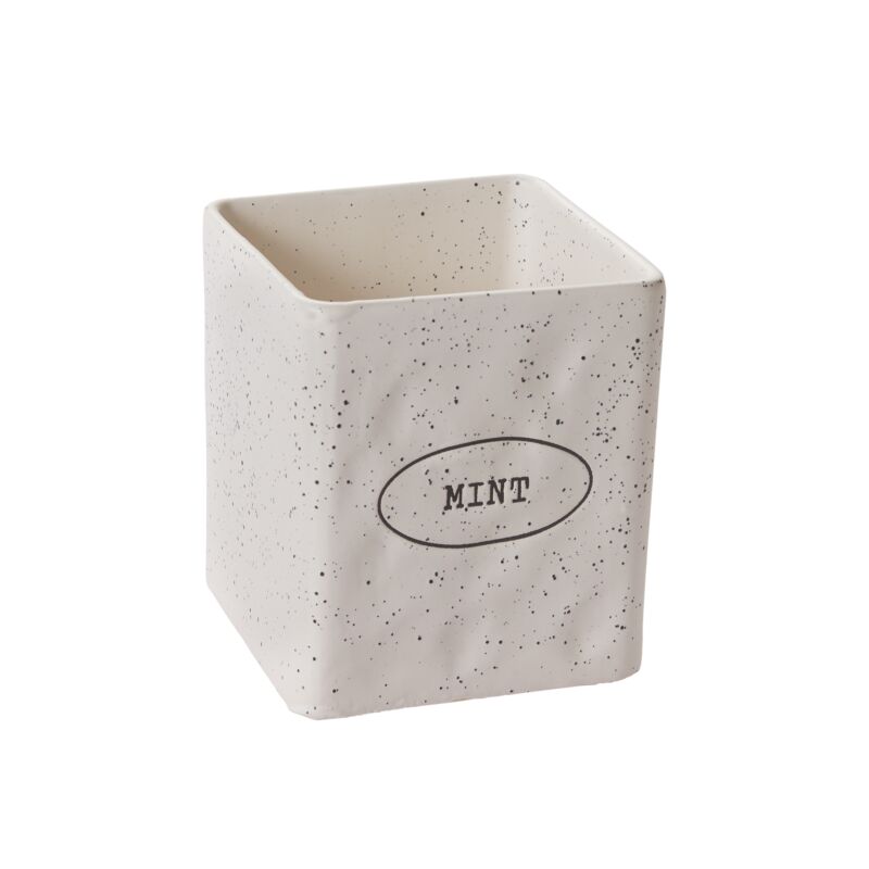 Speckled ceramic container with 'Mint' text on a white background