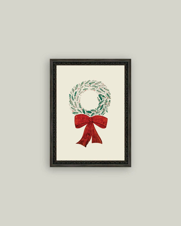 Framed artwork of a Christmas wreath with a red bow on a light gray background