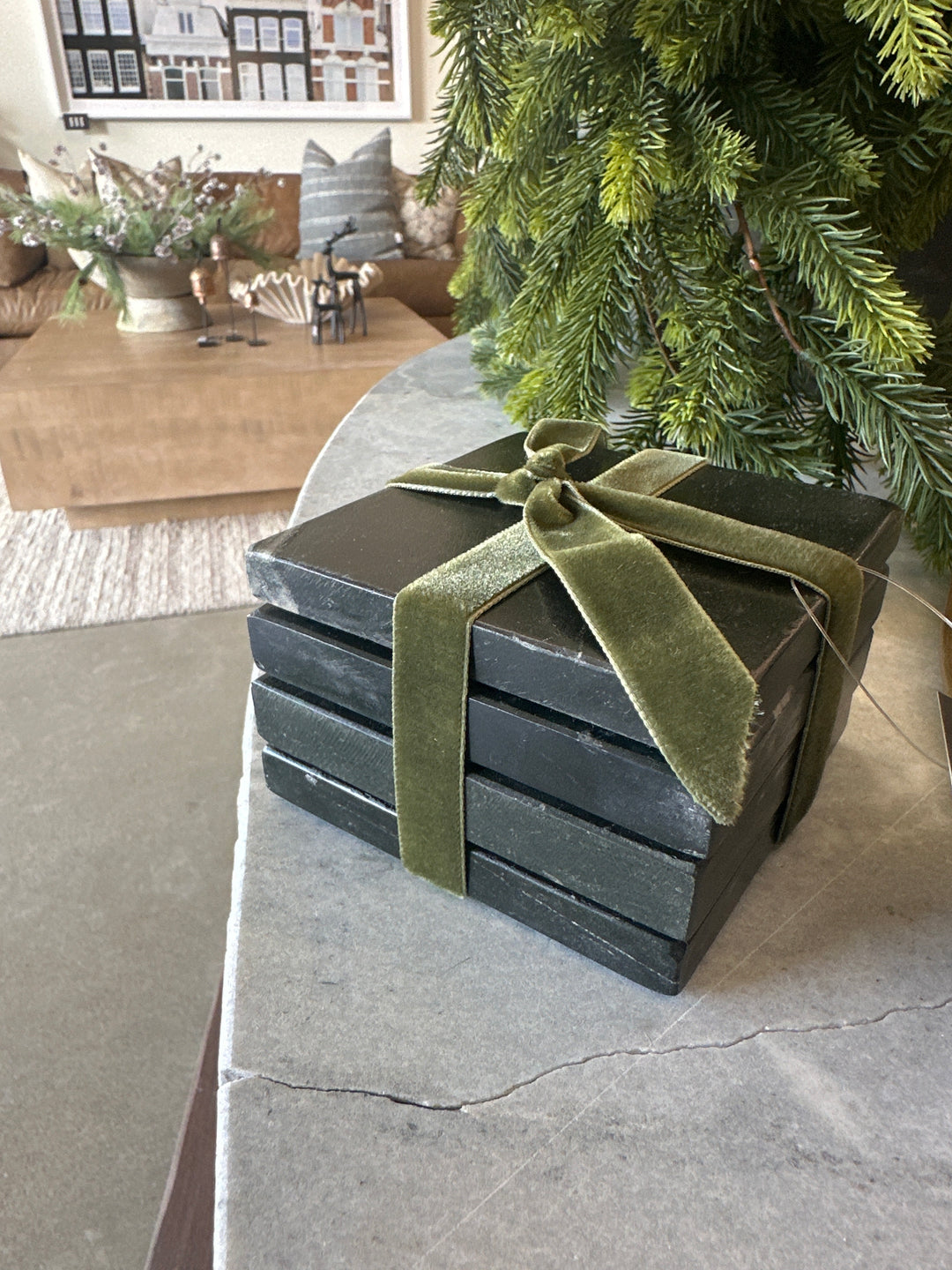 set of four black marble coasters