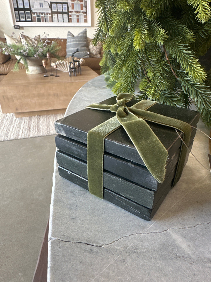 set of four black marble coasters