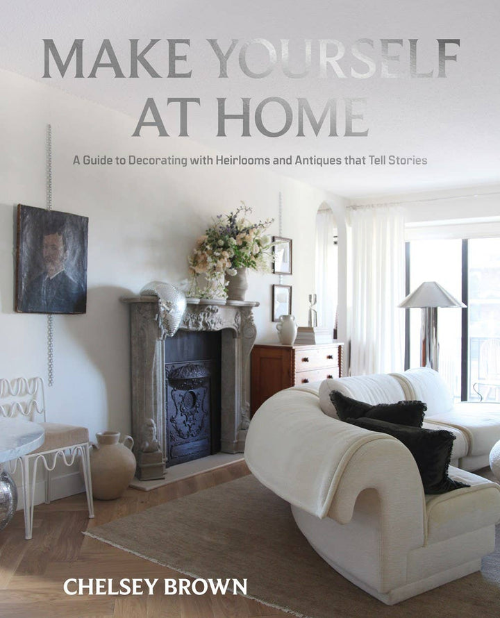 Book cover of 'Make Yourself at Home' by Chelsea Brown, featuring a living room with decor elements.