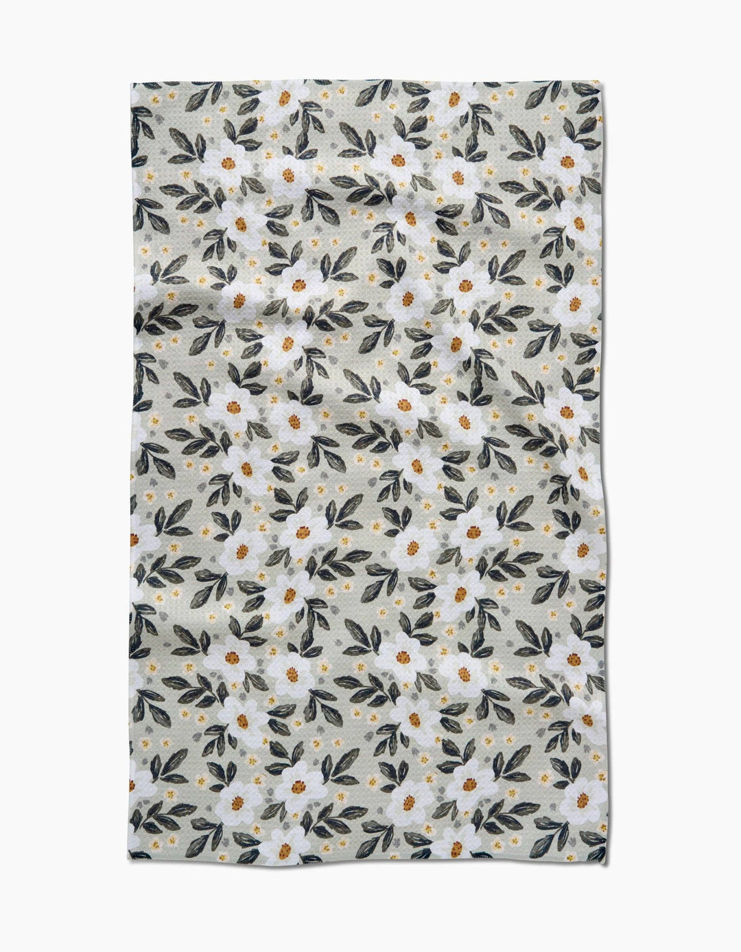Floral patterned geometry towel with small flowers and leaves on a light background