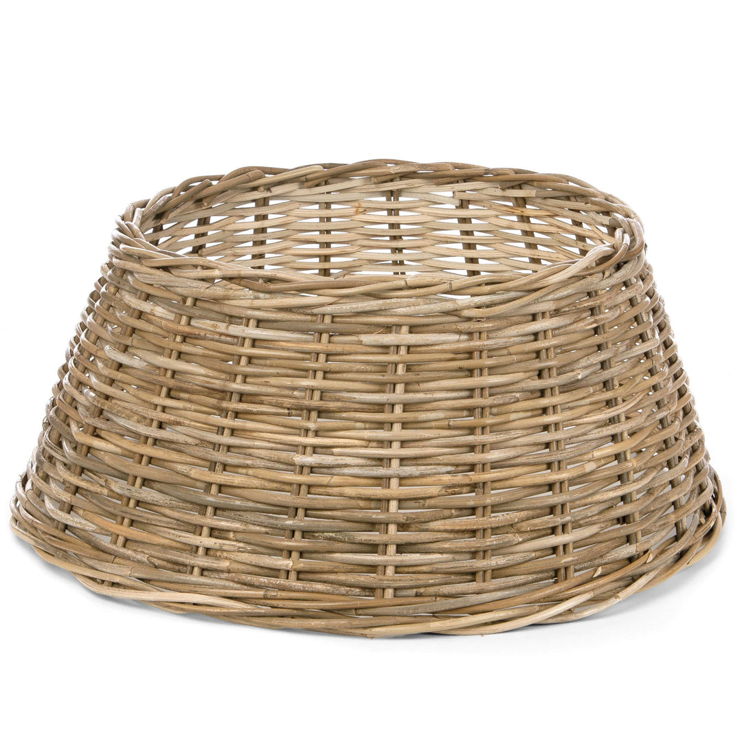 A natural woven wicker basket with a tapered, conical shape, shown on a plain white background.