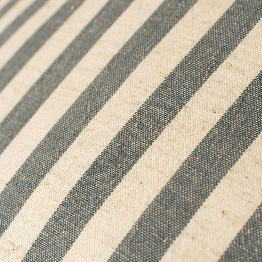 Close-up of fabric with diagonal gray and beige stripes