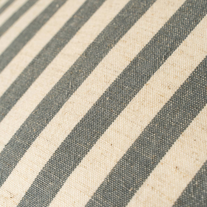 Close-up of fabric with diagonal gray and beige stripes