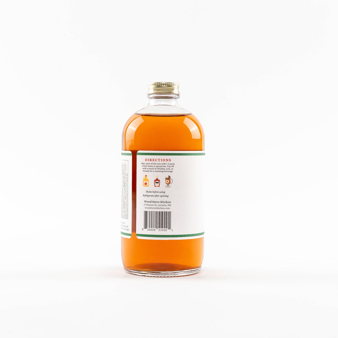 Bottle of syrup with a label 