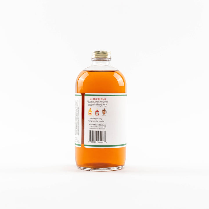 Bottle of syrup with a label 
