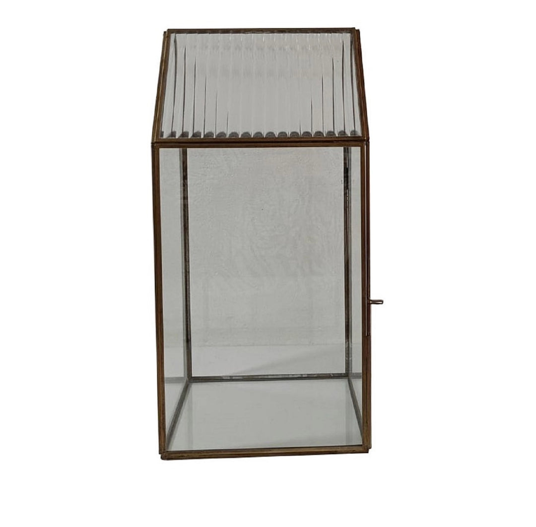 Glass display case with metal frame on a white background