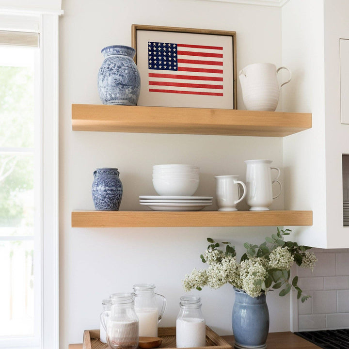 Wooden shelves with decorative items including a vase, cups, and an American flag painting.