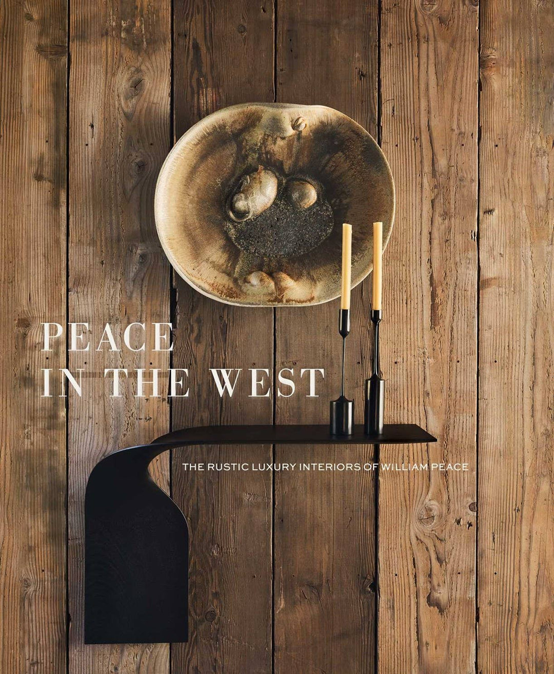 book cover with Decorative plate with candles on a wooden shelf against a wooden wall with 'Peace in the West' text.