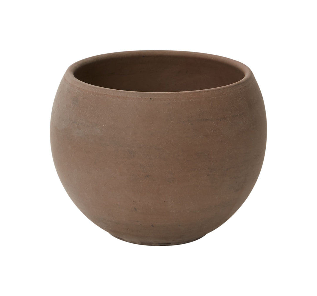 Brown ceramic pot on a white background