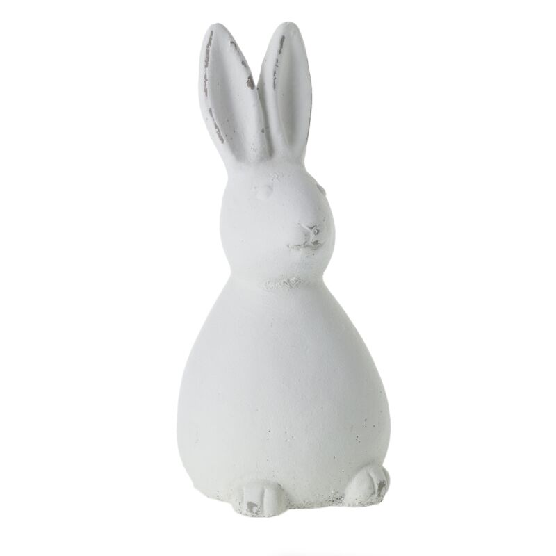 White ceramic rabbit figurine on a white background