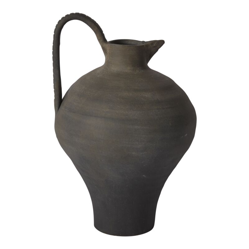 Black ceramic pitcher on a white background