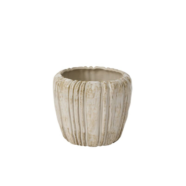 Decorative pot with a textured surface on a white background