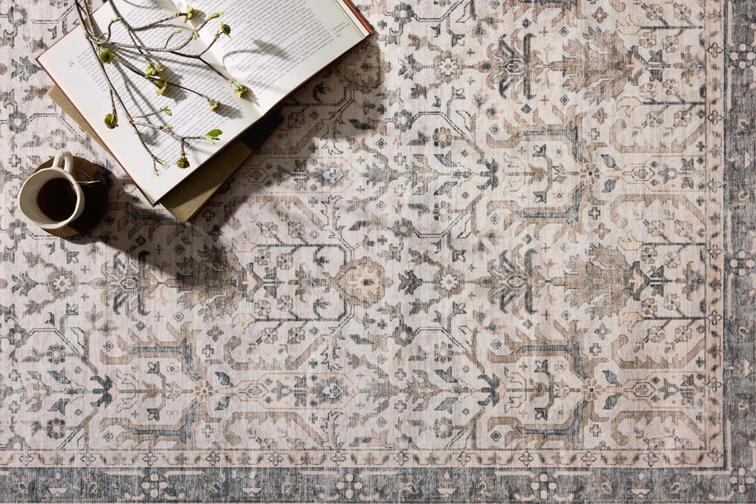 washable rug with traditional motifs in beautifully stone like and distressed tones