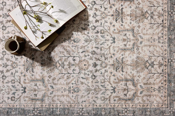 washable rug with traditional motifs in beautifully stone like and distressed tones
