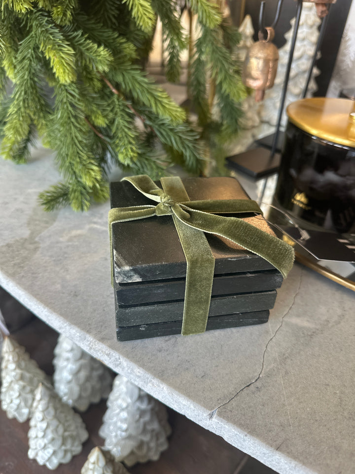 set of four black marble coasters