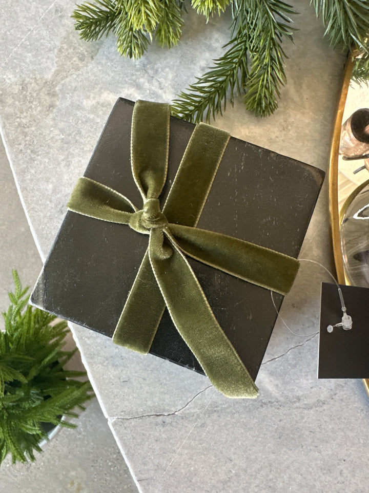 set of four black marble coasters