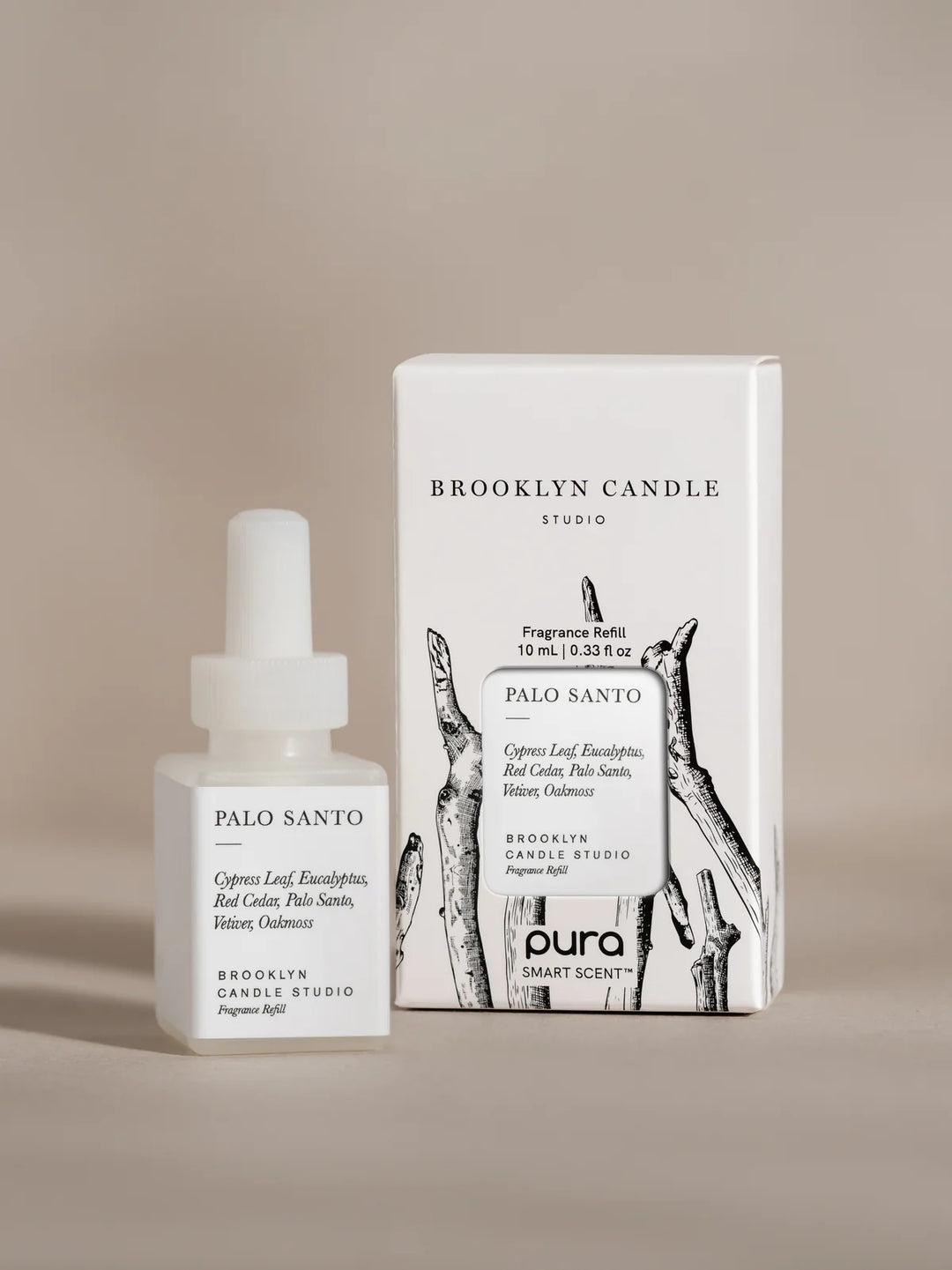 Brooklyn Candle Studio Palo Santo diffuser bottle and packaging on a beige background