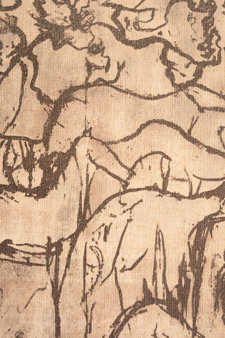 Sketch of a nude figure on textured beige paper