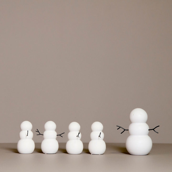 white snowman figurine in two sizes