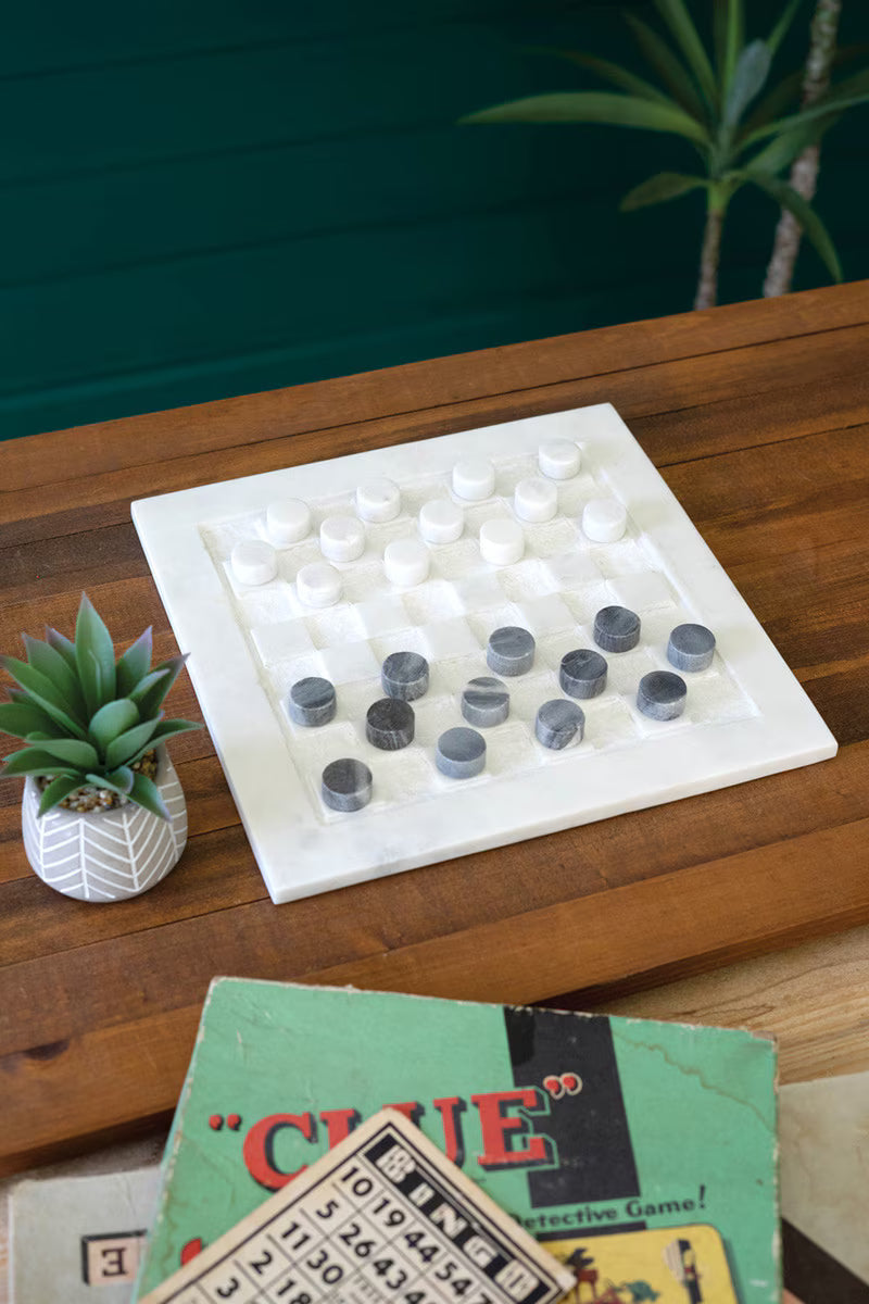marble Checkers game on a wooden table 