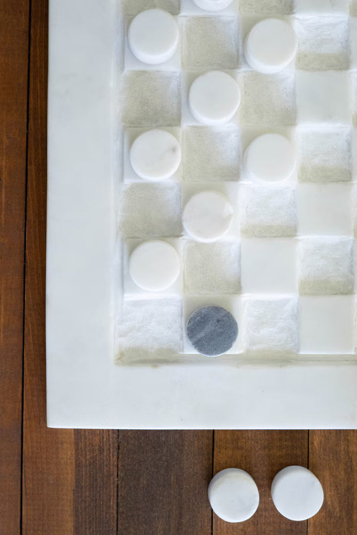 marble checkers set with black and white marble pieces