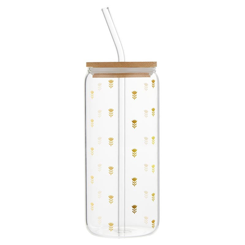 Clear tumbler with gold floral patterns and a bamboo lid on a white background
