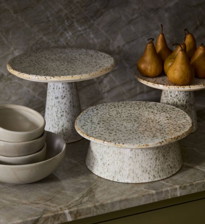 short, medium, and tall size cake plates, white with speckles