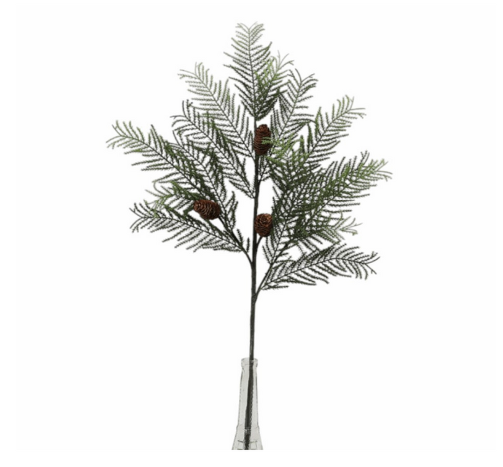 Artificial Christmas pine spray with frosted and full branches, including pine cones, in a clear vase.