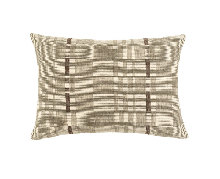A beige and brown geometric patterned throw pillow.