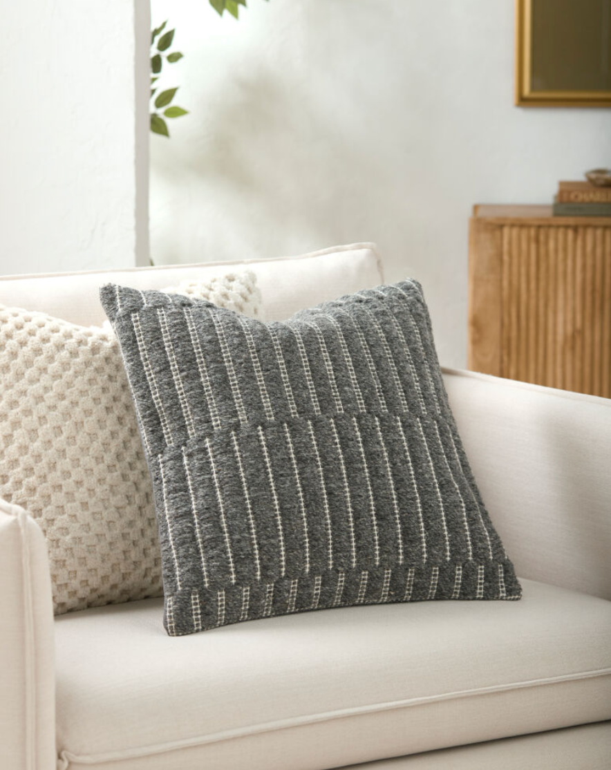 grey textured throw pillow